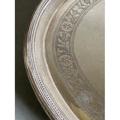 489 - A William IV silver tray on four feet, approximately 43.5cm in length and an approximate total weigh... 