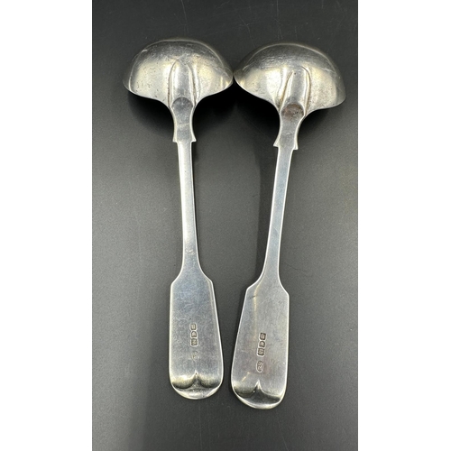 513 - A pair of silver sauce ladles, hallmarked for London by Robert Stebbings 1908. Approximate total wei... 