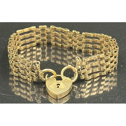 537 - A 9ct yellow gold gate bracelet with heart shaped fastner, approximate total weight 16.3g