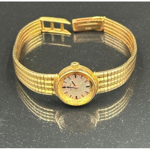 553 - An 18ct gold ladies Omega watch AF with an approximate total weight of 30.6g