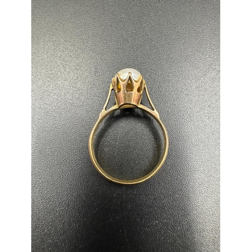 559 - Three gold pearl rings with an approximate total weight of 11g. Size K and L