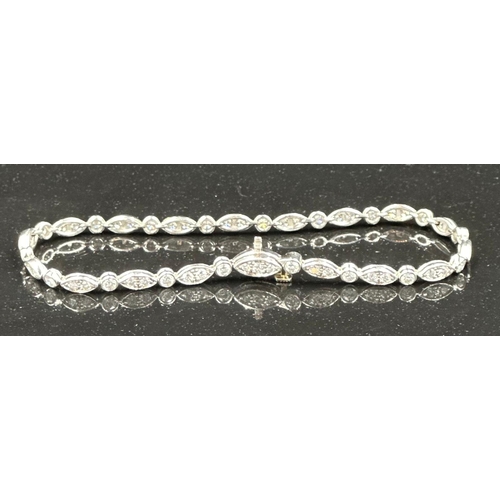 579 - Tiffany diamond bracelet mounted in platinum. Signed Tiffany 950. Total diamond weight approximately... 