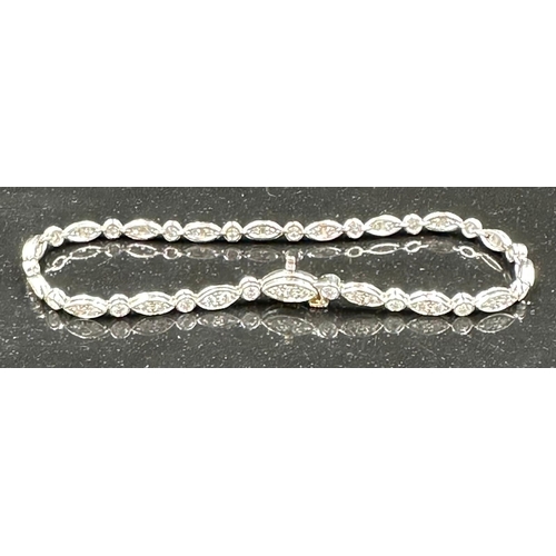 579 - Tiffany diamond bracelet mounted in platinum. Signed Tiffany 950. Total diamond weight approximately... 