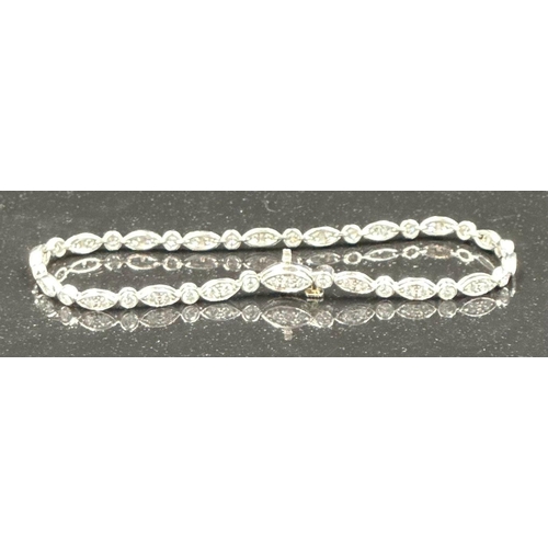 579 - Tiffany diamond bracelet mounted in platinum. Signed Tiffany 950. Total diamond weight approximately... 