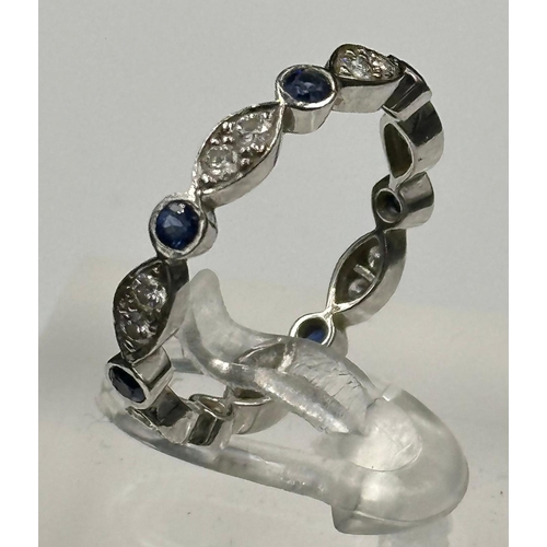 582 - Sapphire and round diamond eternity ring mounted in platinum. Signed T&C 950. Total diamond weight a... 