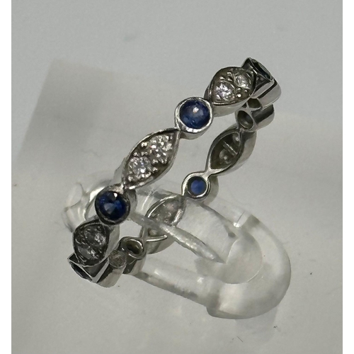 582 - Sapphire and round diamond eternity ring mounted in platinum. Signed T&C 950. Total diamond weight a... 