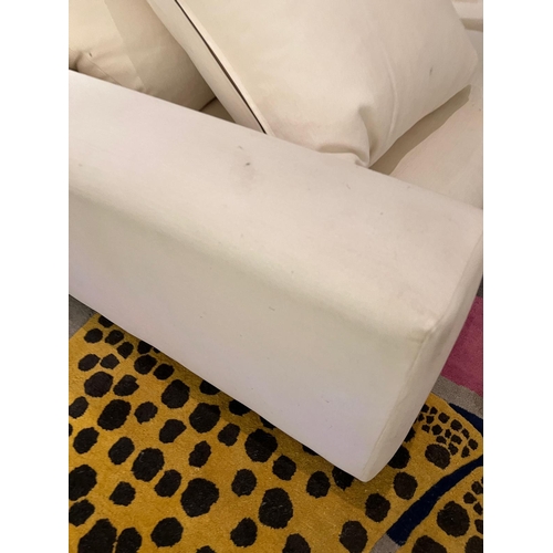 59 - A large white sofa (H57cm W102cm SH42cm)