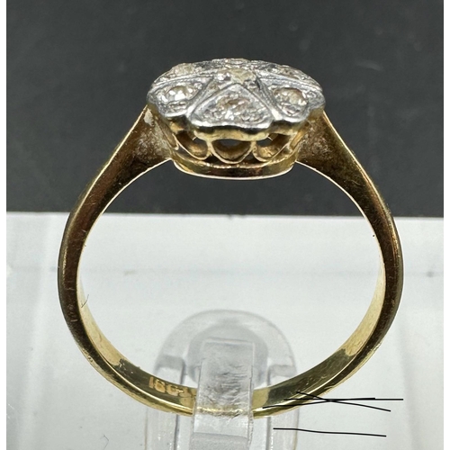 593 - An 18ct yellow gold and platinum vintage diamond ring, size M