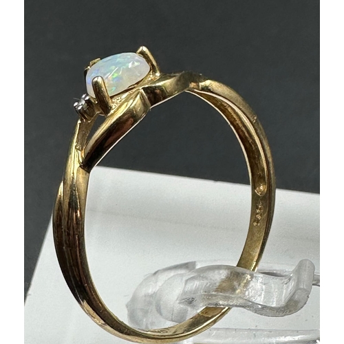 608 - A 9ct gold opal ring, approximate size S1/2, and weight 1.6g