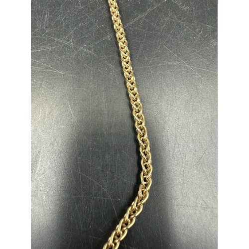 613 - A 9ct gold Figaro style chain (Total weight 18.2g)