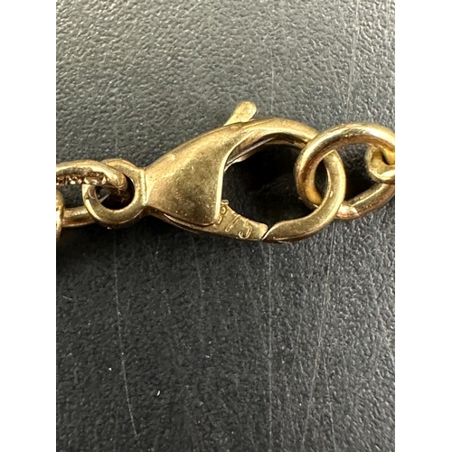 614 - A 9ct gold chain with 9ct gold pendant, cameo style of a horses head. (Approximate weight of necklac... 