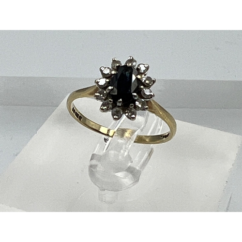 644 - A 9ct gold sapphire and diamond ring in a daisy style, approximate size L.