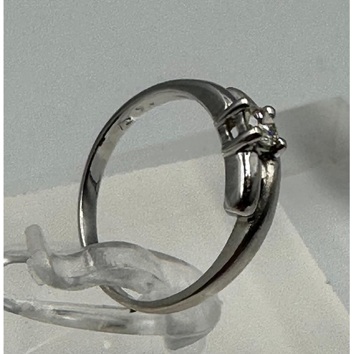 649 - A contemporary white gold and diamond ring, size I