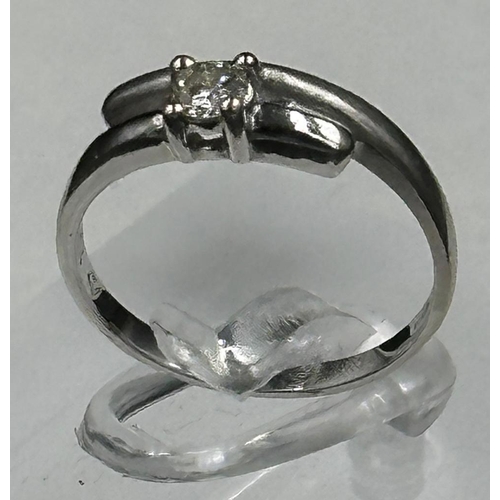 649 - A contemporary white gold and diamond ring, size I