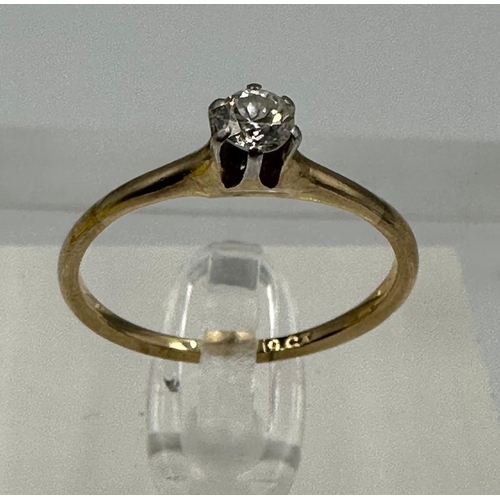 658 - A 9ct gold and diamond ring, approximate size O