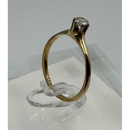 658 - A 9ct gold and diamond ring, approximate size O