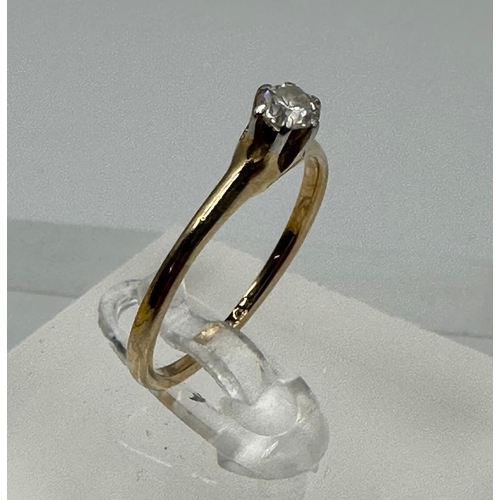 658 - A 9ct gold and diamond ring, approximate size O