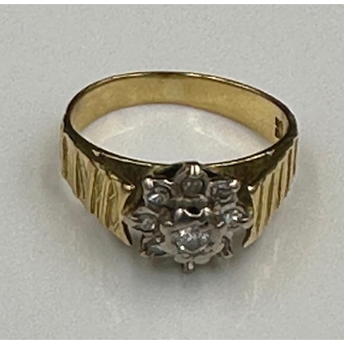 667 - An 18ct gold and diamond ring, approximate weight 4.4g.