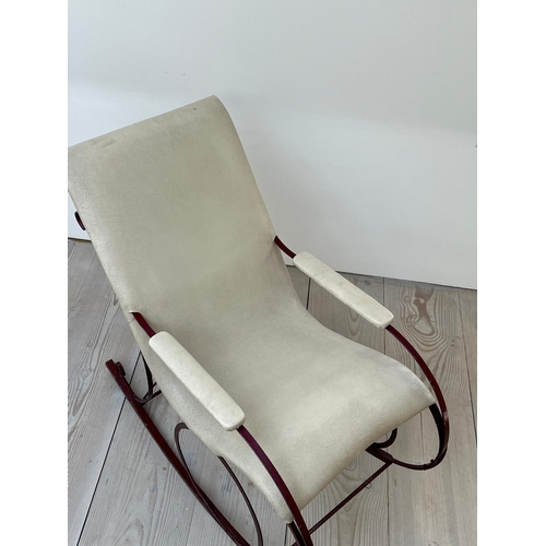 67 - A late Victorian rocking chair, upholstered later (H92cm W102cm D53cm)