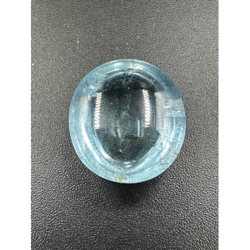 675 - A natural oval cabochon aqua18mm x 16mma 18.04ct