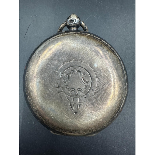 699 - A silver pocket watch hallmarked for Chester 1906