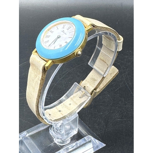 706 - A vintage Hermes, blue bezel watch on stainless steel with white leather strap.