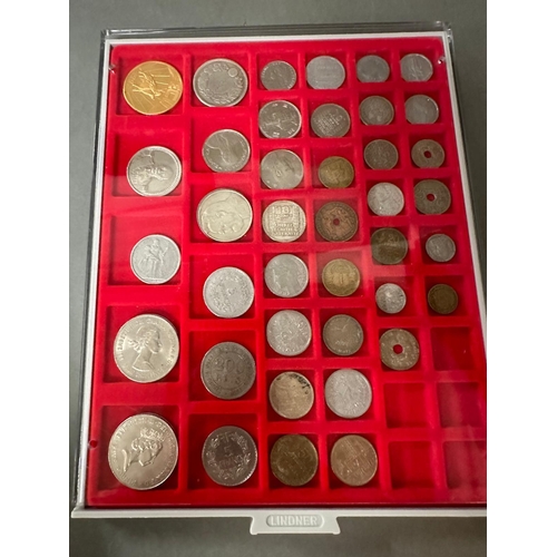 711 - A selection of world coins in seven trays, including Indian, Russian etc.