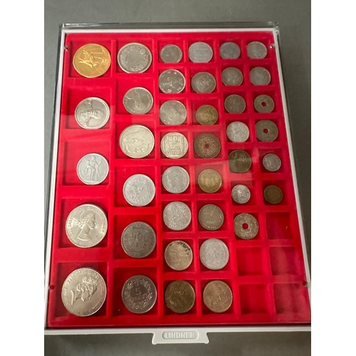 711 - A selection of world coins in seven trays, including Indian, Russian etc.