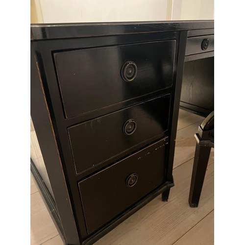 72 - A French ebony style desk with  ring pull handles and matching chair  (H78cm W177cm D81cm)