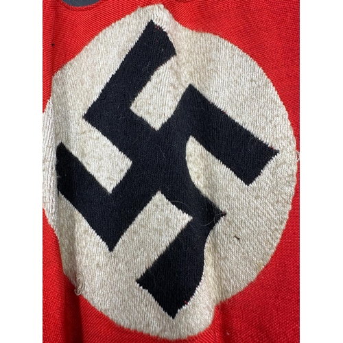 733 - A WWII era Nazi party arm band with RZM paper label to interior, numbered 421870