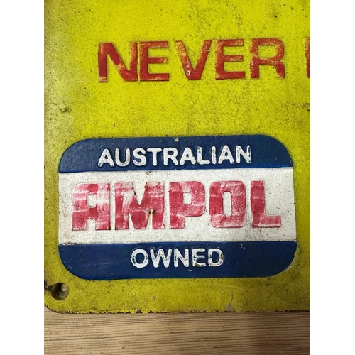 746 - A cast iron yellow pointed Australian outback road sign 57cm x 38cm