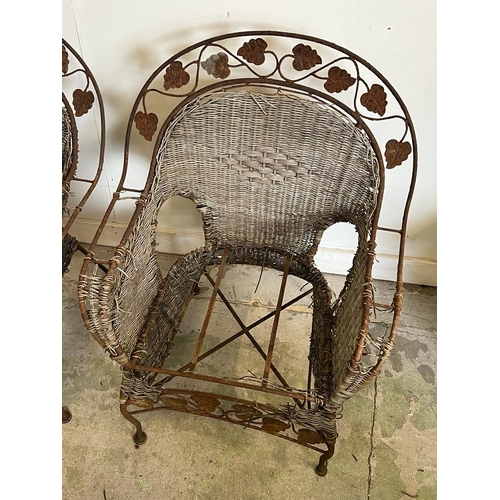 75 - A pair of reclaimed wire work chairs with fig leaf's AF