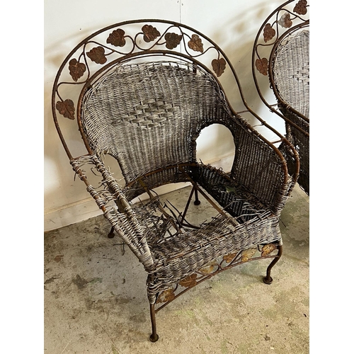 75 - A pair of reclaimed wire work chairs with fig leaf's AF