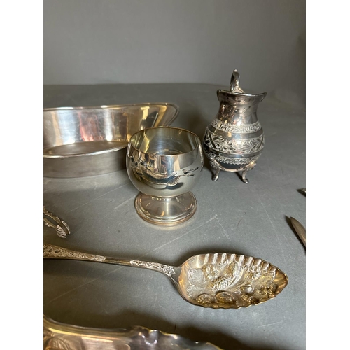 753 - A quality selection of silverplated items to include a fish scale tray, knife rests, berry spoons, g... 