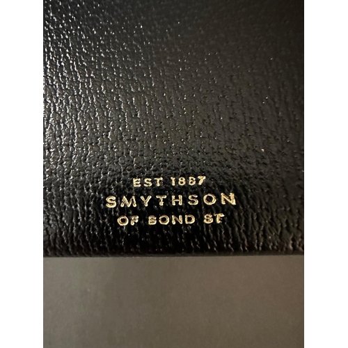 755 - A leather Smythson album with black sheets, box and dust cover 41cm x 32cm