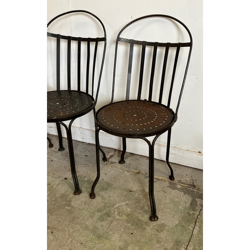 76 - Three Arts and Crafts style iron work chairs (H83cm Dia41cm)