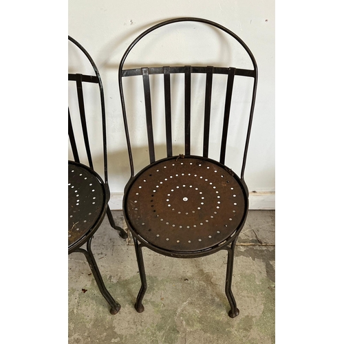 76 - Three Arts and Crafts style iron work chairs (H83cm Dia41cm)