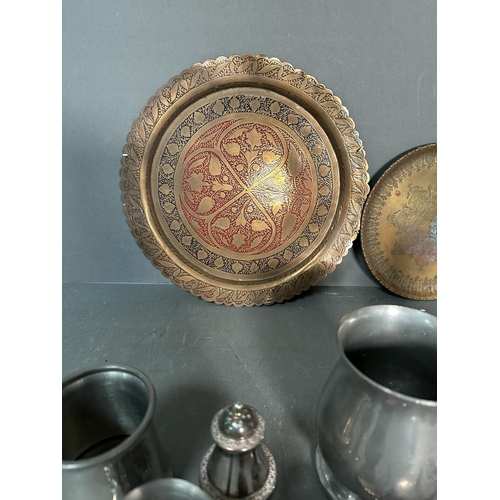 761 - A selection of mixed metal items to include plates, tankards etc