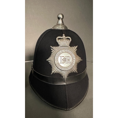 763 - Three vintage police helmets. Humberside, West Midlands and Devon and Cornwall forces