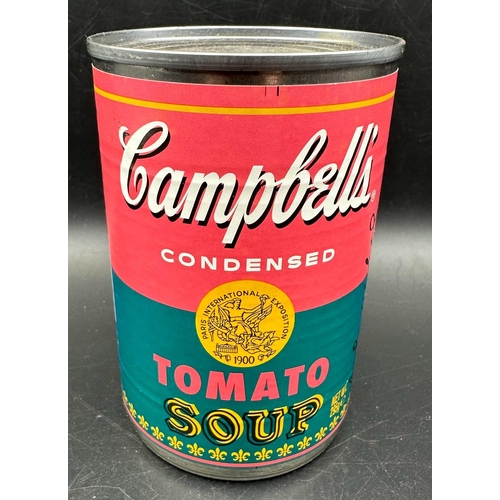 766 - A set of four Andy Warhol Foundation Campbells tomato soup cans, limited edition and a framed Campbe... 