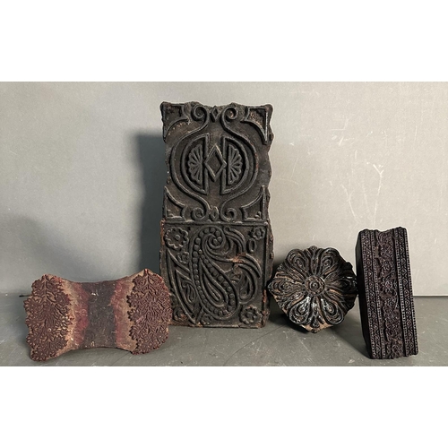 770 - Four vintage carved wooden printing blocks in various decorative patterns