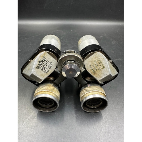 778 - A pair of Prinz micro field binoculars and a Britannic brass telescope