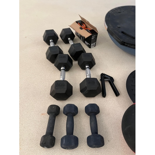 791 - A large selection of Gym equipment including weights, plates box, boxing gloves etc