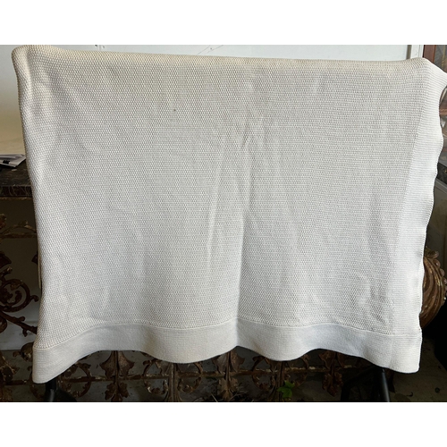 818 - A white knitted Ralph Lauren throw 275cm x 230cm