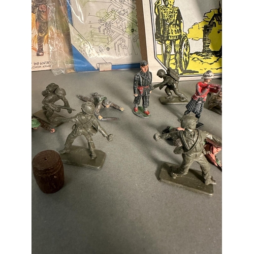 840 - A selection of military model kits and toy soldiers to include Airfix, Century Series and some Russi... 