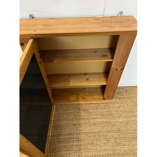 85 - A pine wall cabinet (H72cm W17cm D19cm)