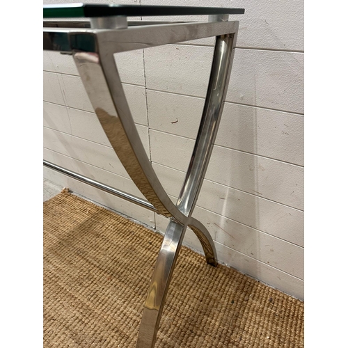 97 - A contemporary chrome and glass X frame console table (H80cm W120cm D40cm)