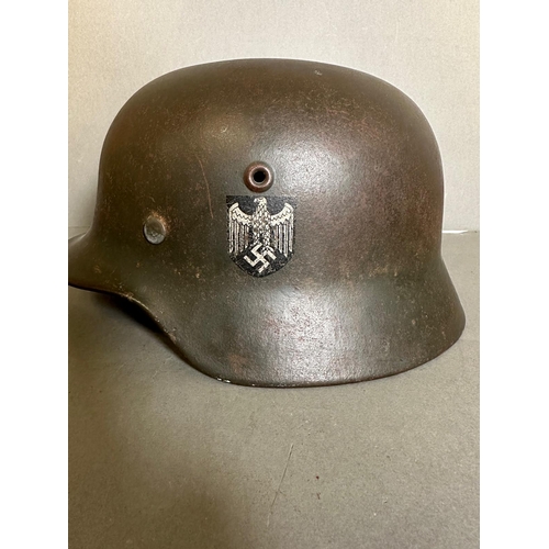 725 - A WWII German guards helmet