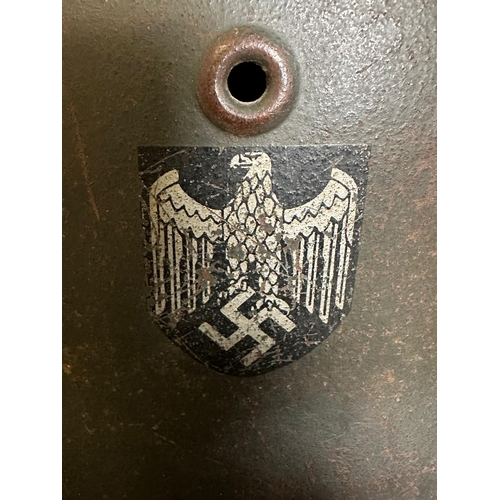 725 - A WWII German guards helmet