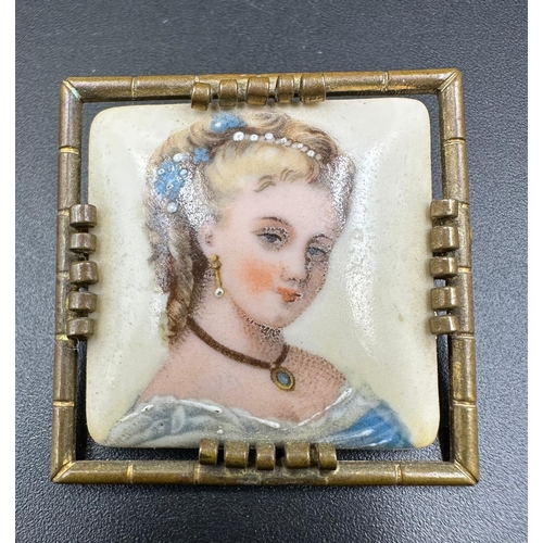 374 - Limoges France porcelain portrait brooch pair from the mid 20th century